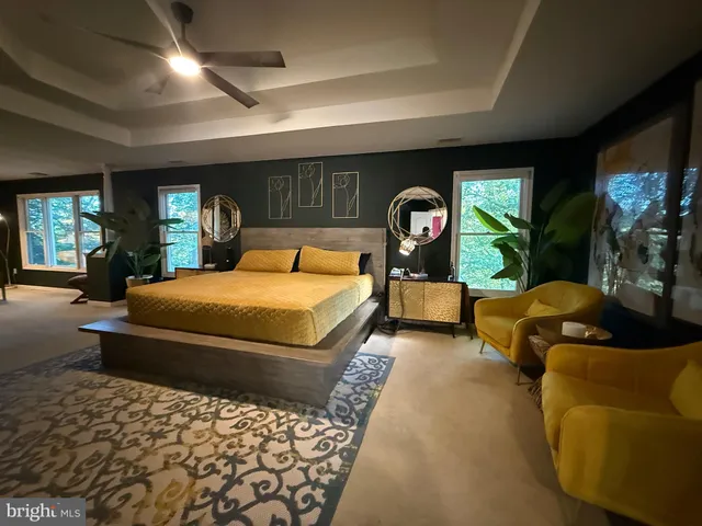 a living room with a couch and a fireplace