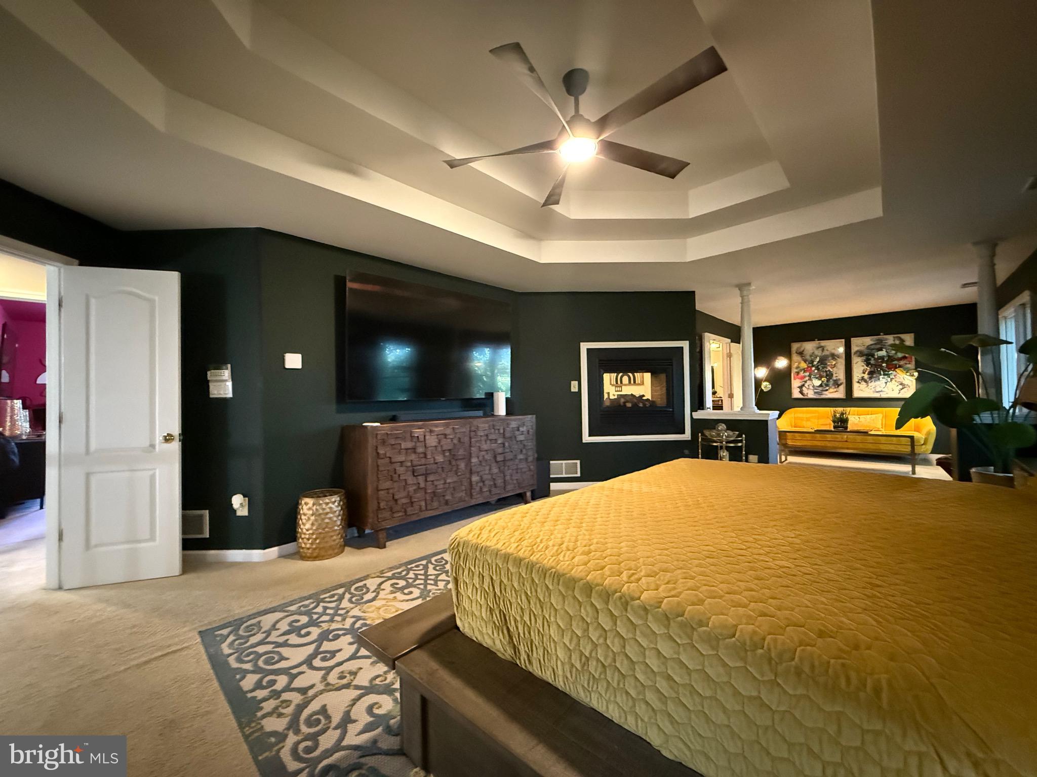 155 Erica Court Swedesboro, NJ 08085 - Photo 31 of 55 a bedroom with a bed and a chandelier