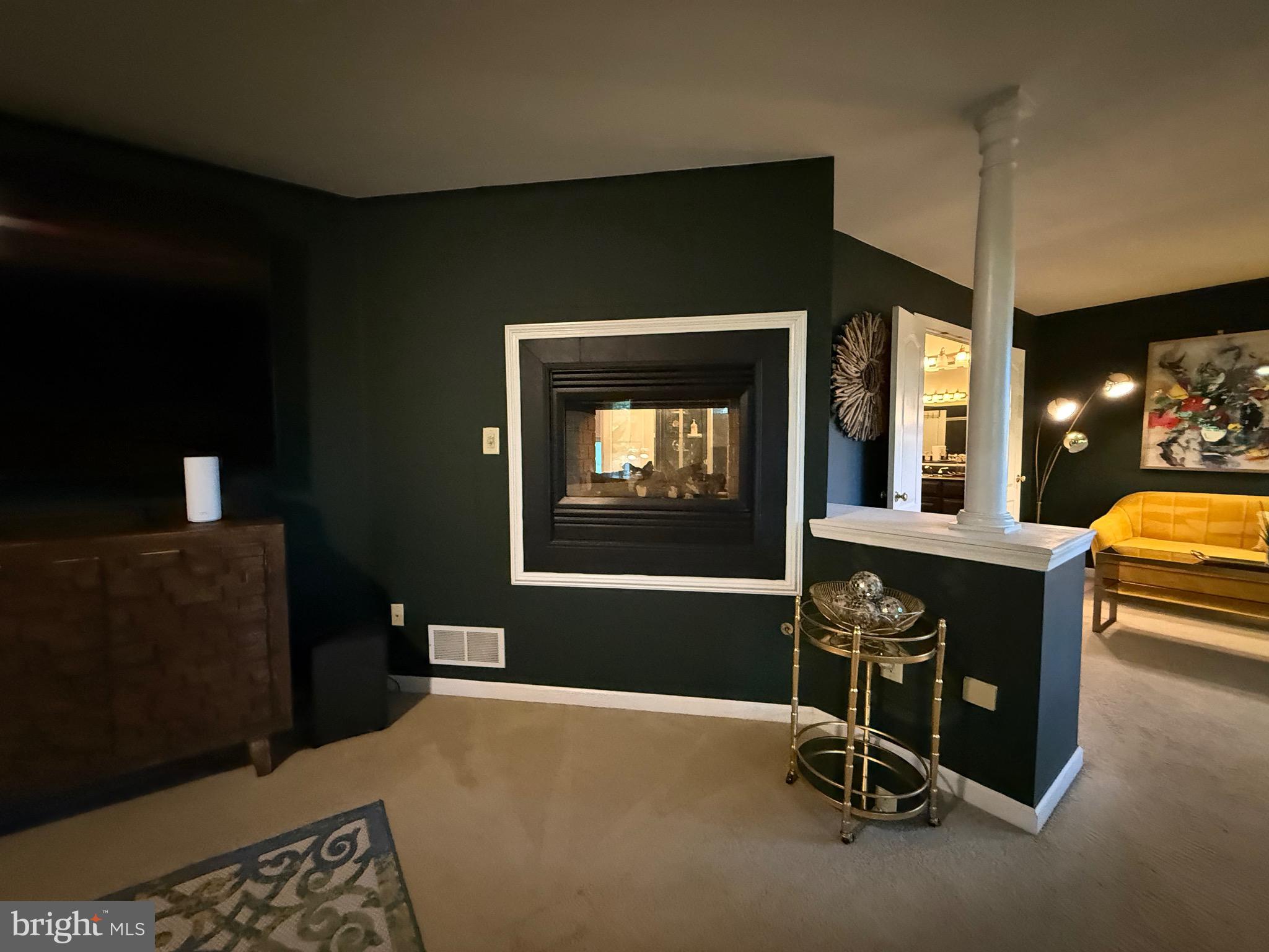 155 Erica Court Swedesboro, NJ 08085 - Photo 32 of 55 a living room with a couch and a fireplace