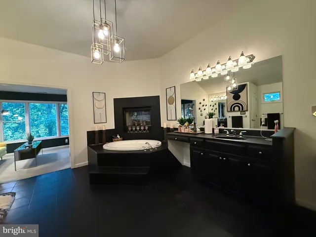 a view of living room with furniture and window