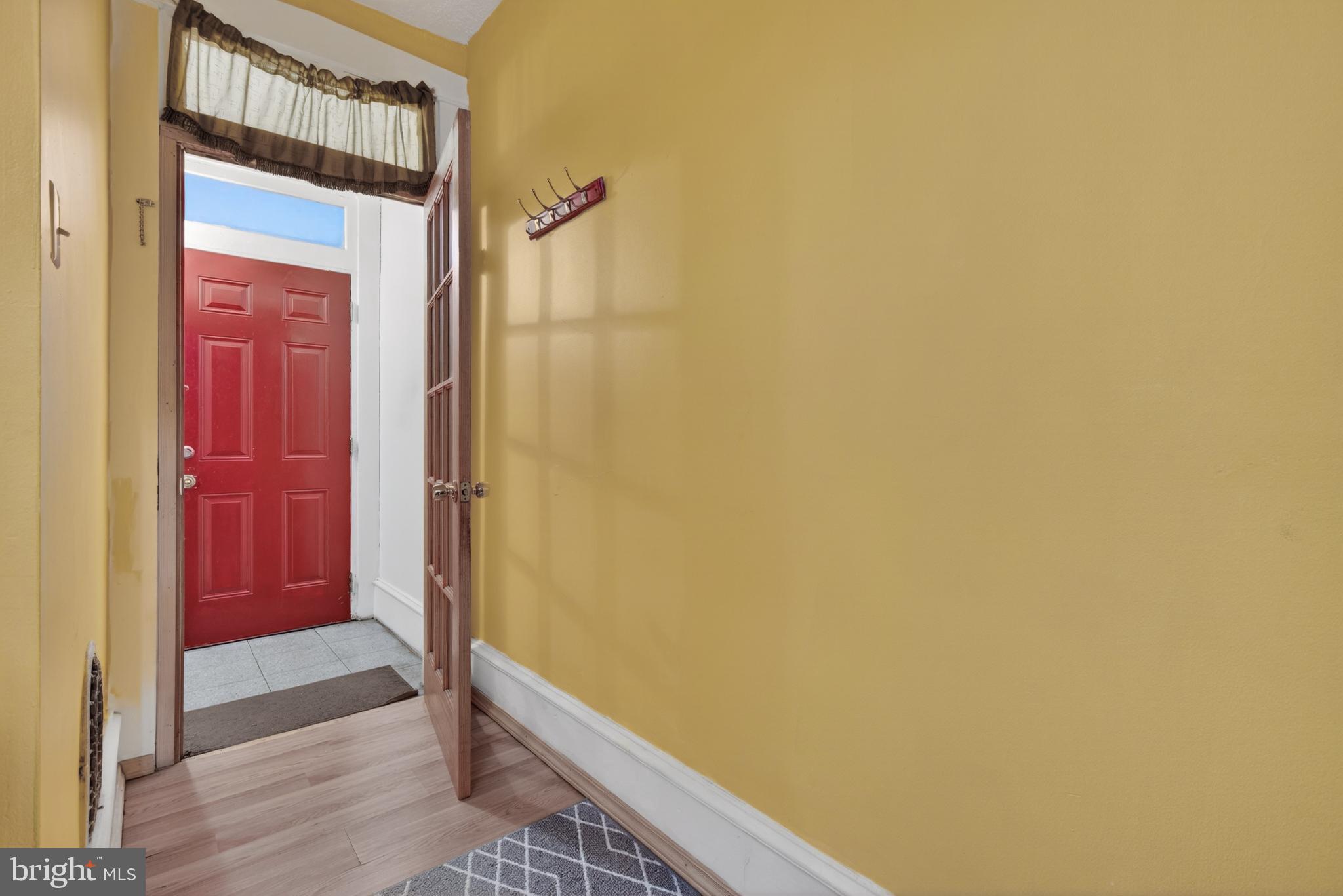 340 East Frederick Street Lancaster, PA 17602 - Photo 5 of 32 Vibrant entryway with a bold red door.