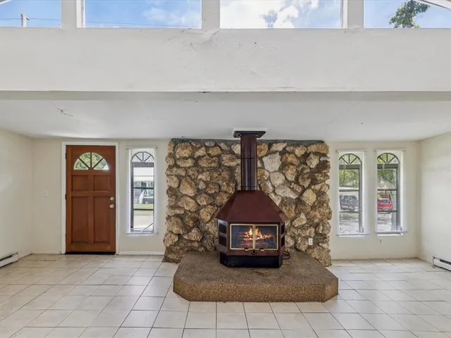 a view of a livingroom with furniture and chandelier