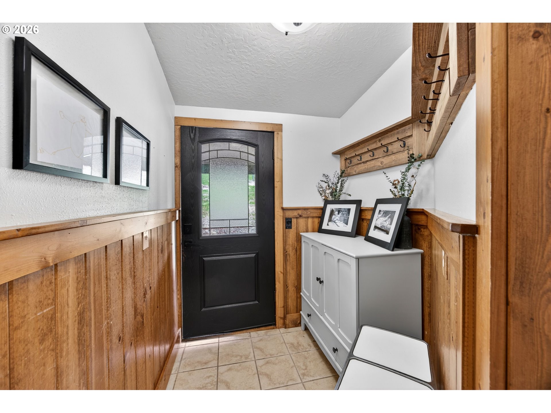6895 Canary Road Westlake, OR 97493 - Photo 4 of 40 a view of hallway with washer and dryer
