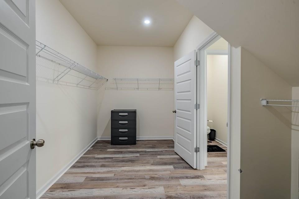 3 Oak Ridge Court Northeast Rome, GA 30165 - Photo 16 of 22 a view of a hallway with wooden floor and closet
