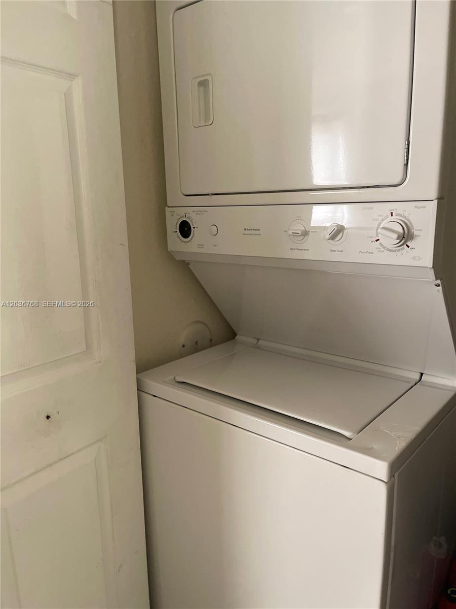 2432 Southwest 99th Way Miramar, FL 33025 - Photo 16 of 17 a close up view of washer and dryer