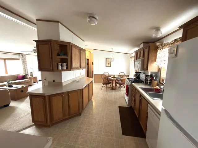 a view of a backyard of the house