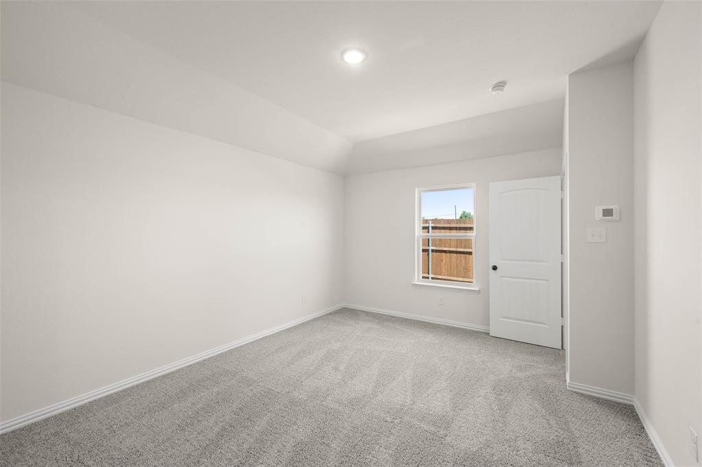 426 Rose Avenue Cleburne, TX 76033 - Photo 16 of 20 an empty room with windows