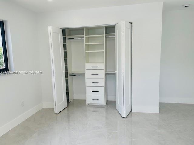 11870 Southwest 5th Street, Unit 1 Miami, FL 33184 - Photo 38 of 38 wooden view of an empty room