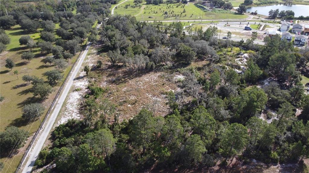 2500 Zuni Road St. Cloud, FL 34771 - Photo 3 of 4 an aerial view of a houses with a yard