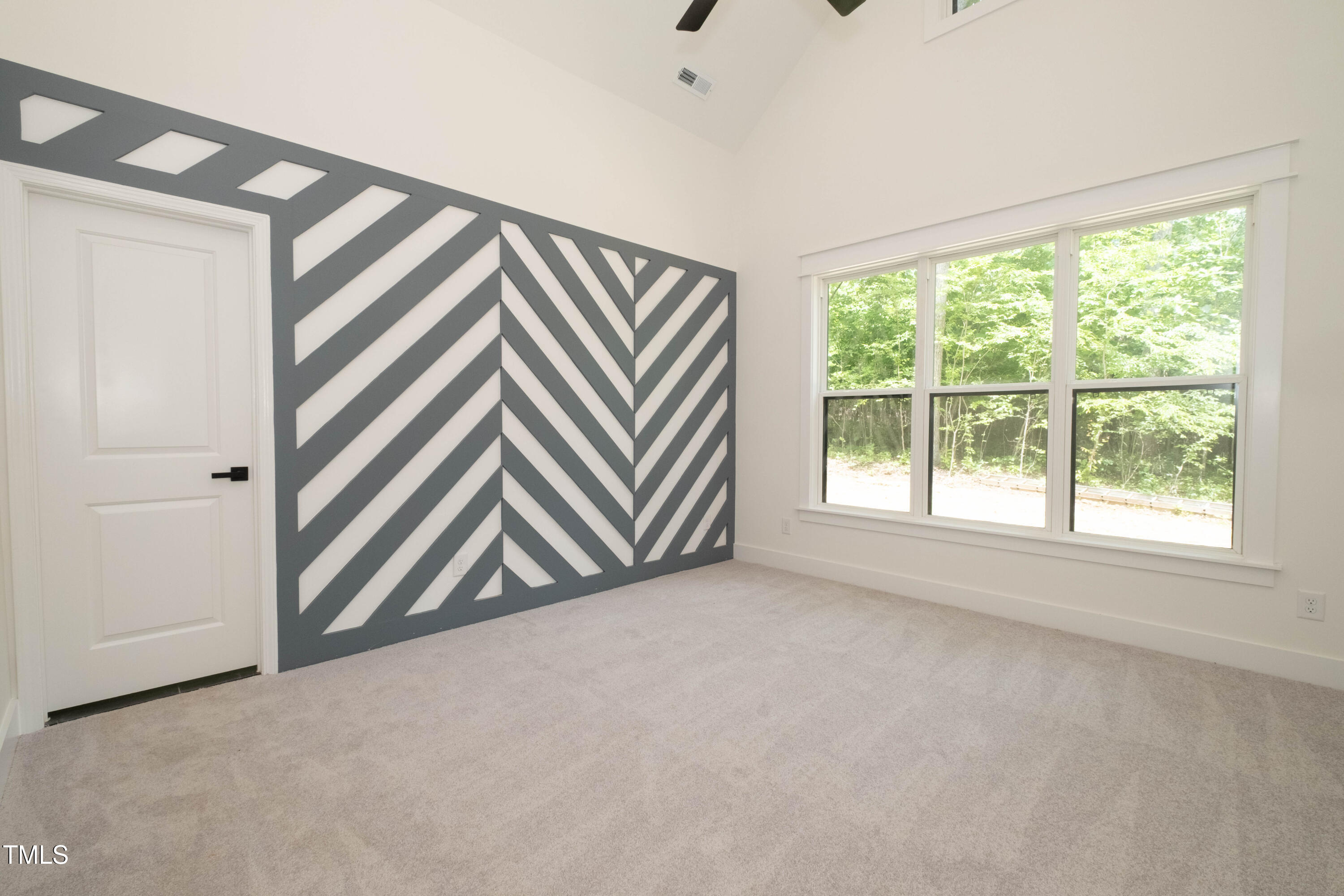 690 Oaks Lane Road Timberlake, NC 27583 - Photo 20 of 31 an entryway with a projector and a window