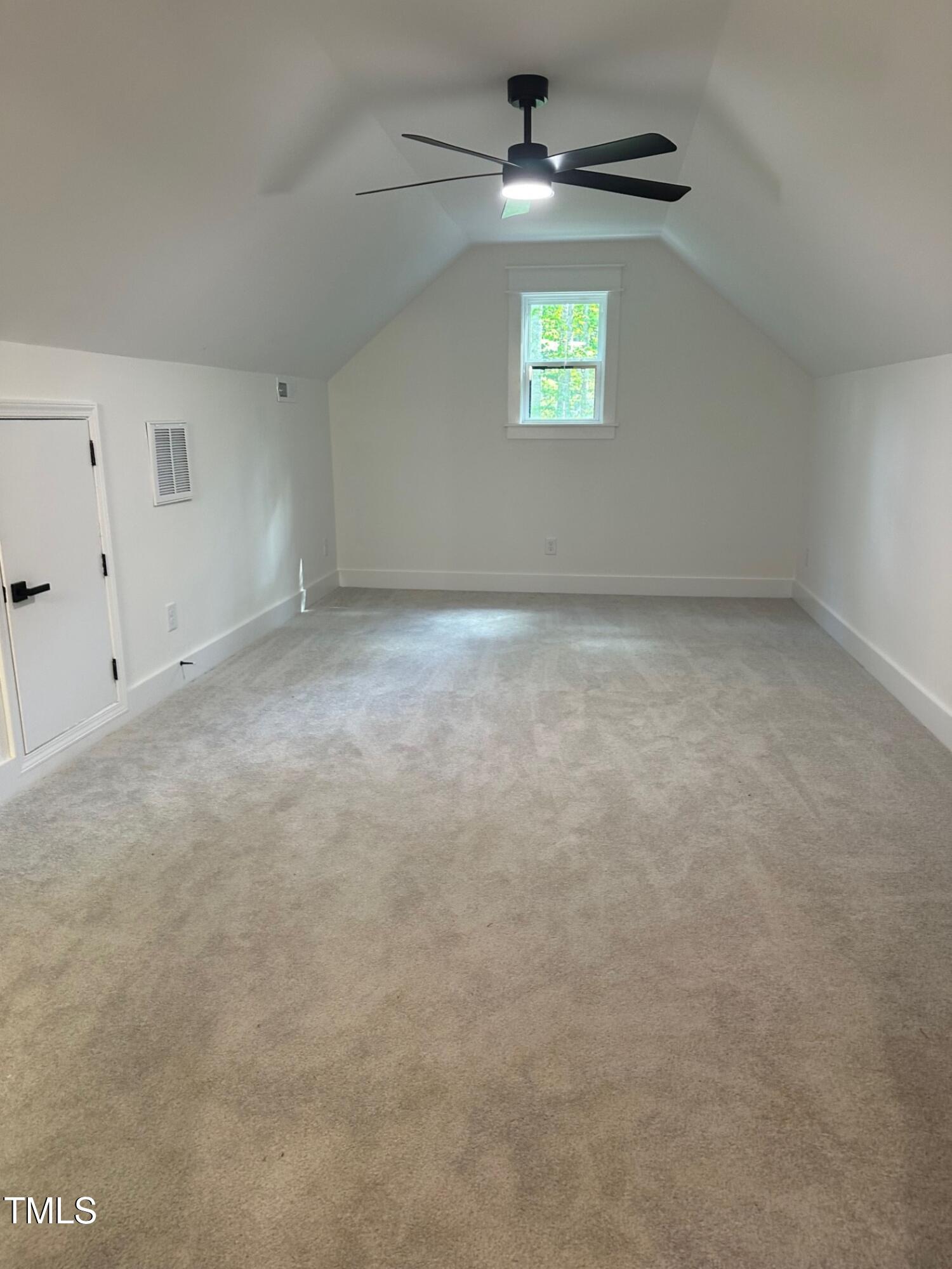690 Oaks Lane Road Timberlake, NC 27583 - Photo 26 of 31 an empty room with windows and ceiling fan