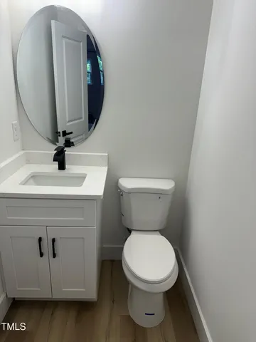a bathroom with a toilet and a sink
