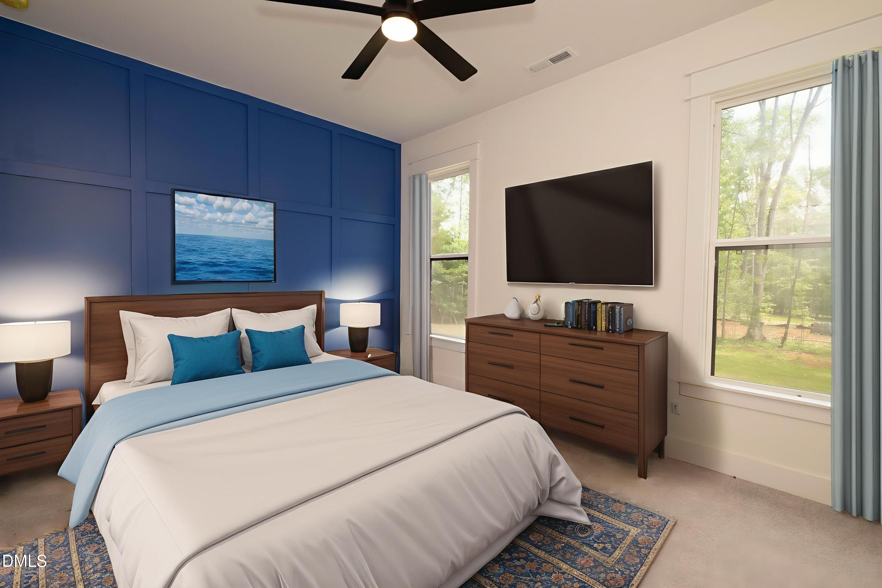 690 Oaks Lane Road Timberlake, NC 27583 - Photo 8 of 31 a bedroom with a bed and a flat screen tv