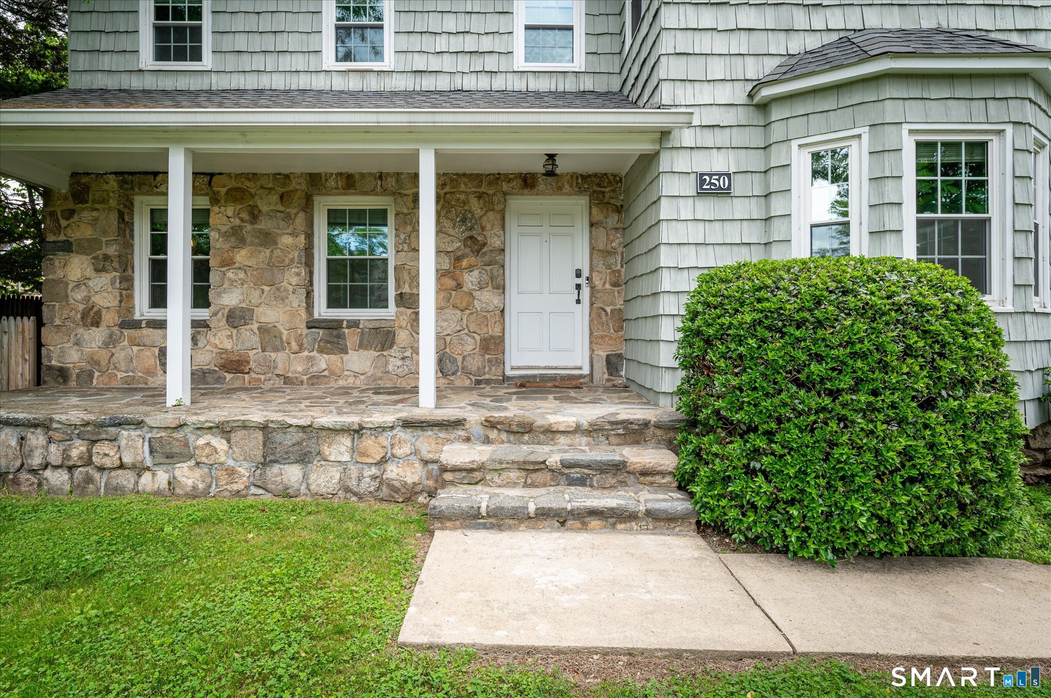 250 High Ridge Road Stamford, CT 06905 - Photo 2 of 22 Enjoy coffee from your beautiful covered stone porch