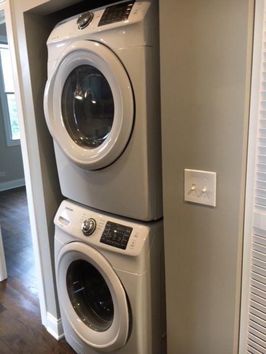 1545 North Claremont Avenue, Unit 2 Chicago, IL 60622 - Photo 11 of 13 a utility room with dryer and washer