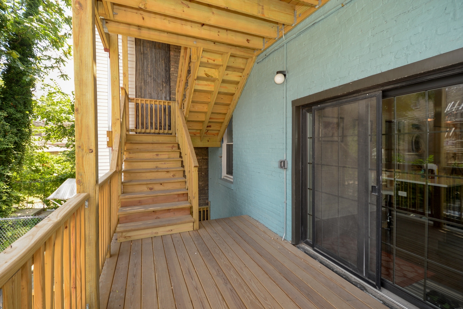 1545 North Claremont Avenue, Unit 2 Chicago, IL 60622 - Photo 12 of 13 a view of a entryway door with wooden floor