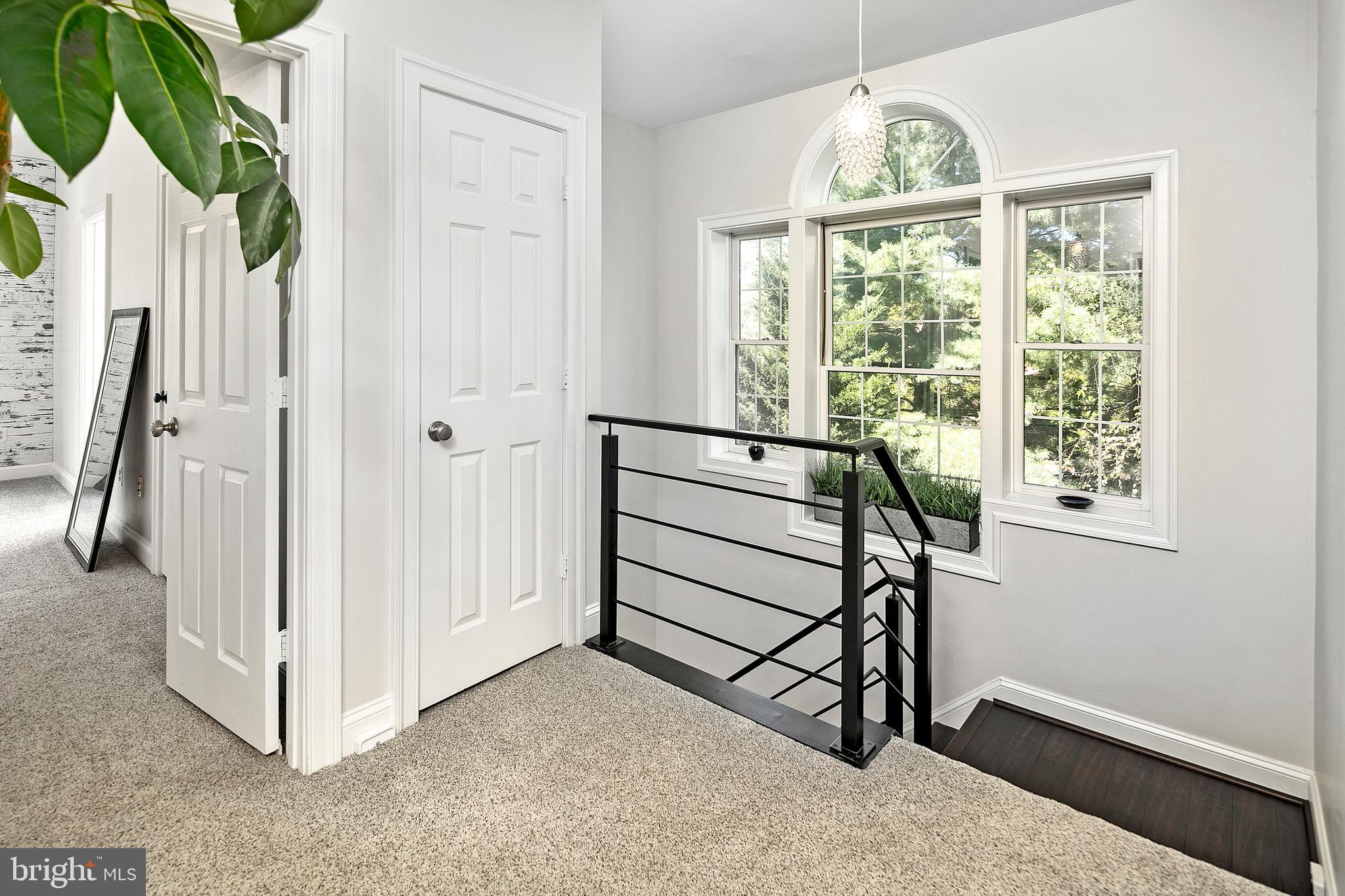 1340 Sundial Drive Reston, VA 20194 - Photo 22 of 38 Upstairs hallway w/ light filled space