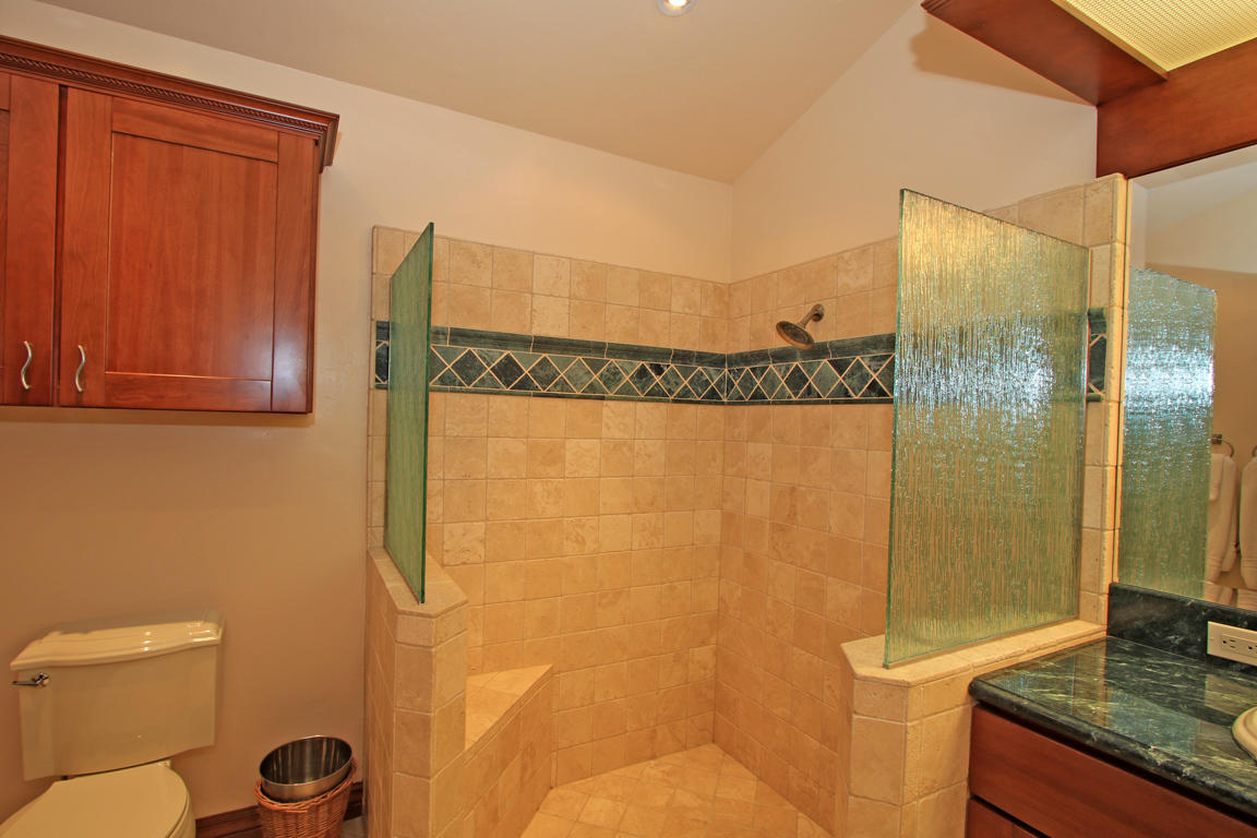 210 Wagon Wheel Road Palm Desert, CA 92211 - Photo 20 of 27 a bathroom with a granite countertop bathtub shower sink and toilet
