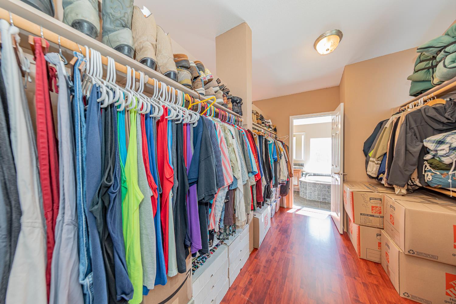 3335 Wildcat Road Mariposa, CA 95338 - Photo 32 of 48 a view of walk in closet with clothes and shoes