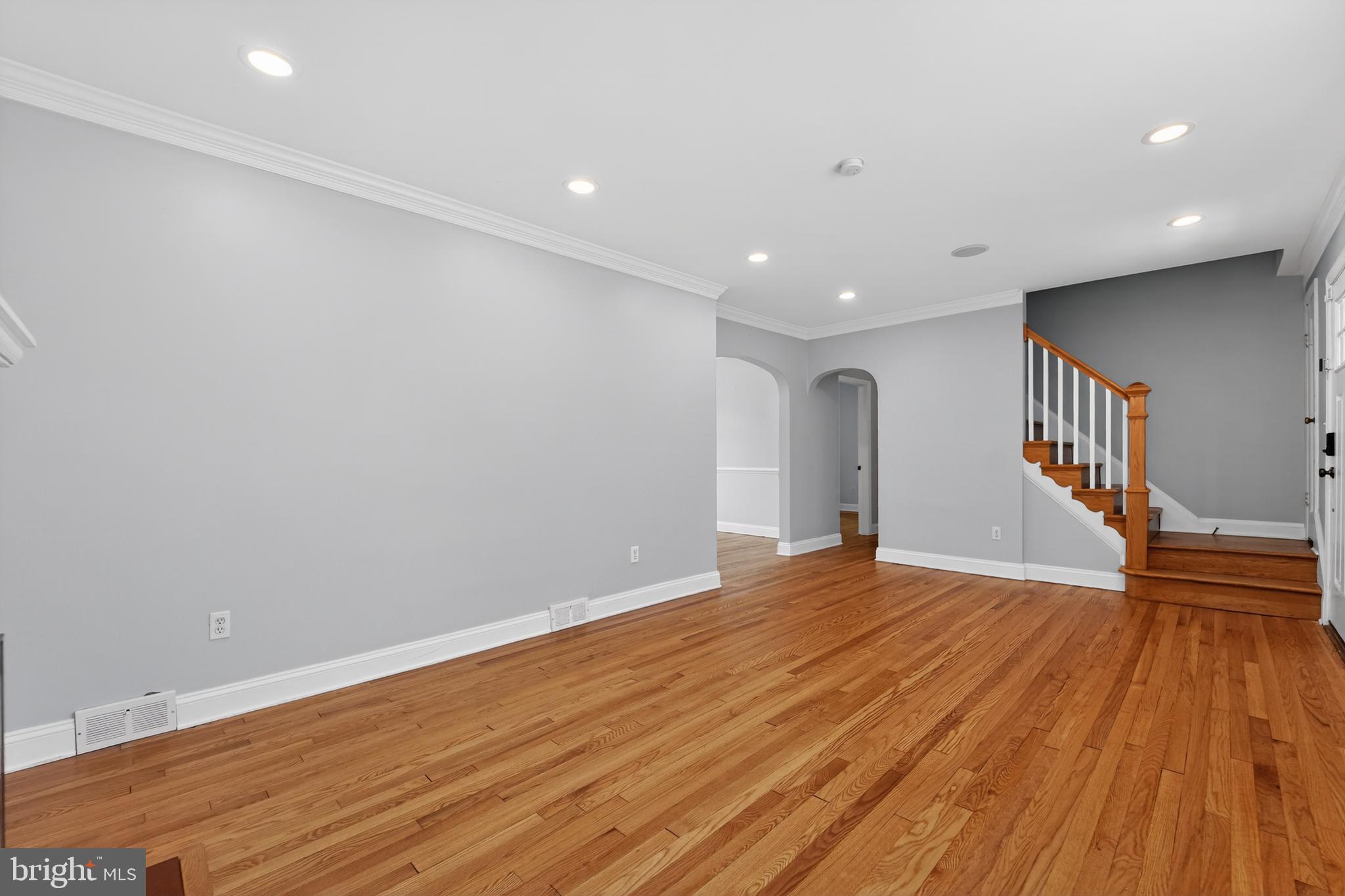 9408 Dana Vista Road Baltimore, MD 21236 - Photo 12 of 38 a view of empty room with wooden floor and window