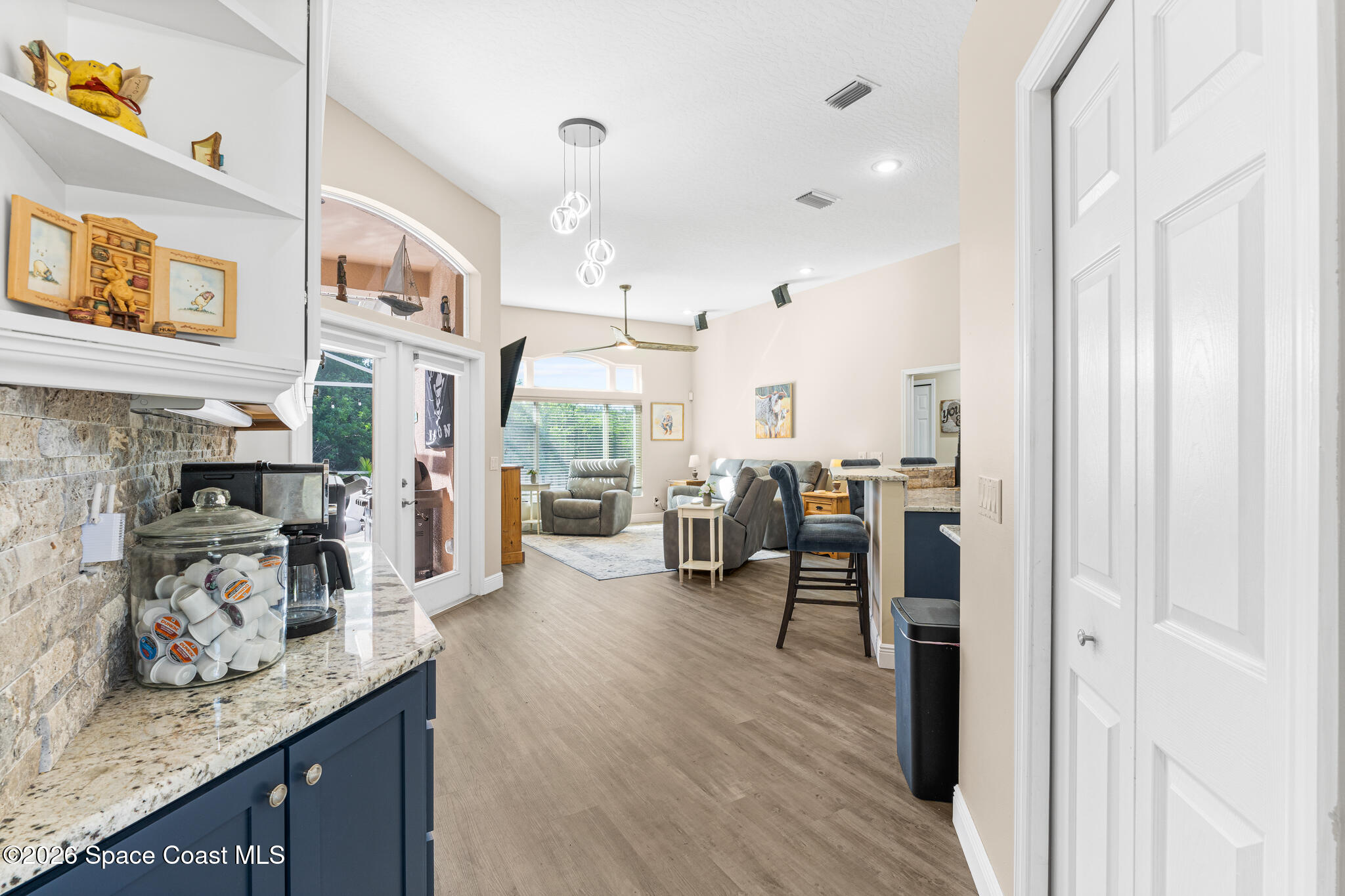 1697 Atrium Drive Melbourne, FL 32935 - Photo 12 of 42 View into Living Room
