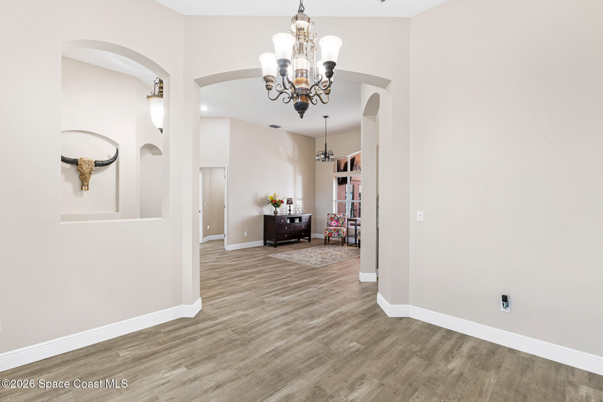 1697 Atrium Drive Melbourne, FL 32935 - Photo 17 of 42 View from Formal Dining Room