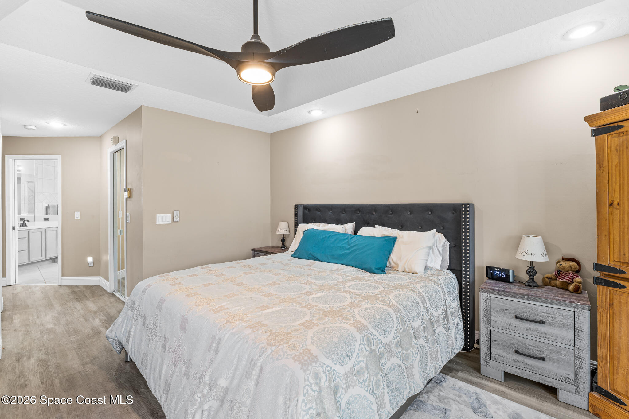 1697 Atrium Drive Melbourne, FL 32935 - Photo 21 of 42 Primary Bedroom