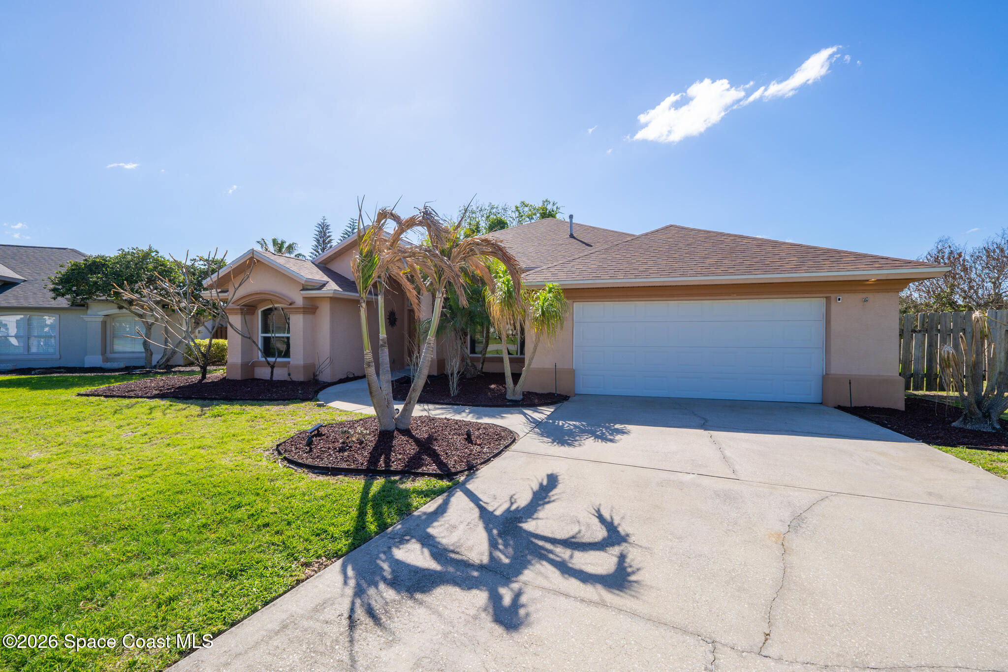 1697 Atrium Drive Melbourne, FL 32935 - Photo 29 of 42 2-Car Garage & Expansive Driveway