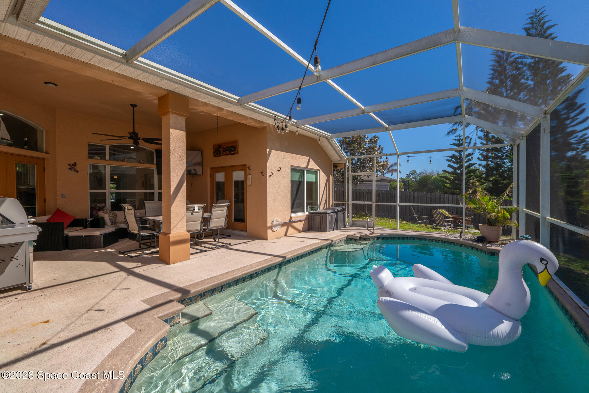1697 Atrium Drive Melbourne, FL 32935 - Photo 31 of 42 Covered Pool & Patio