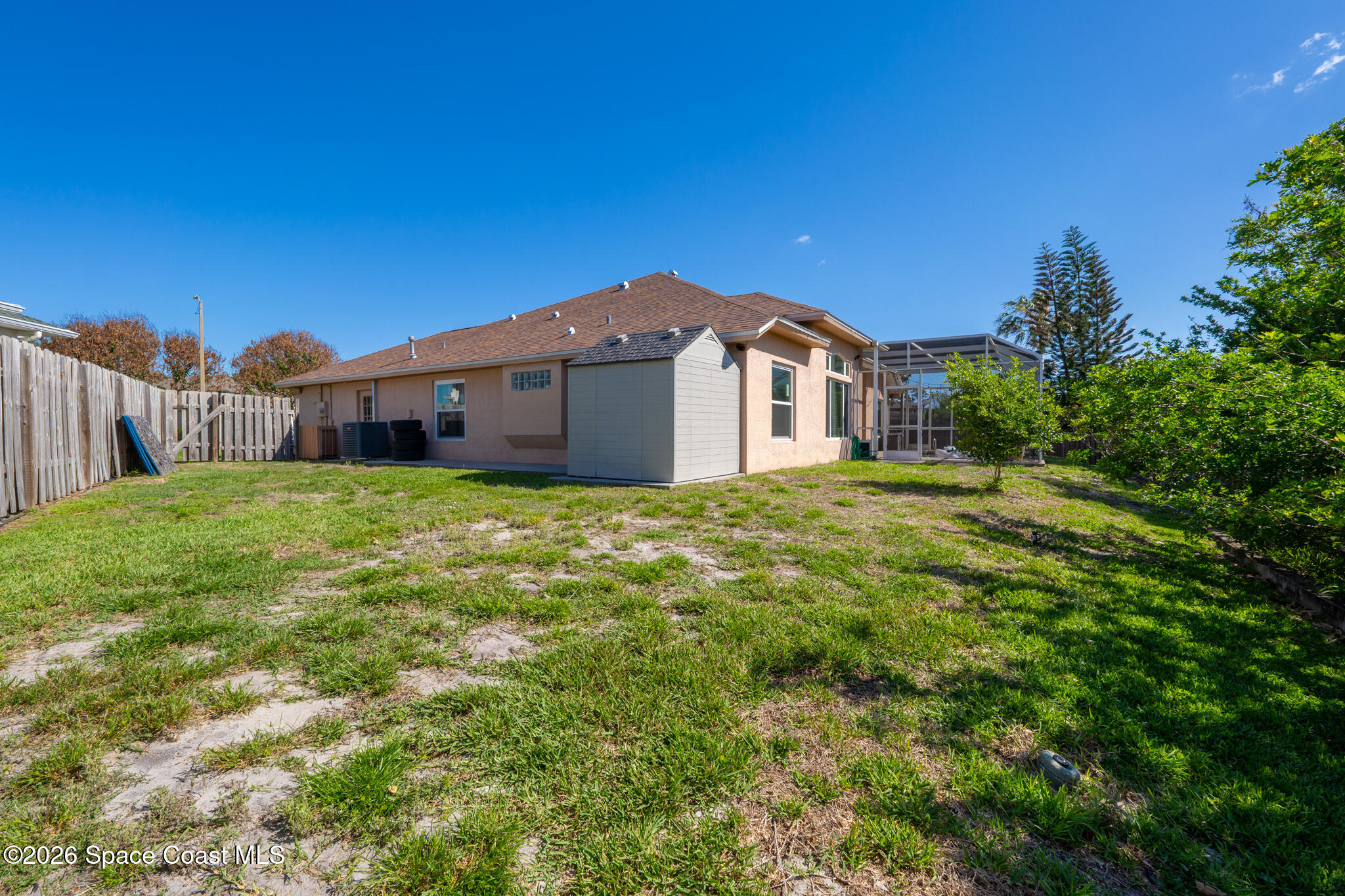 1697 Atrium Drive Melbourne, FL 32935 - Photo 32 of 42 Fully-Fenced Backyard