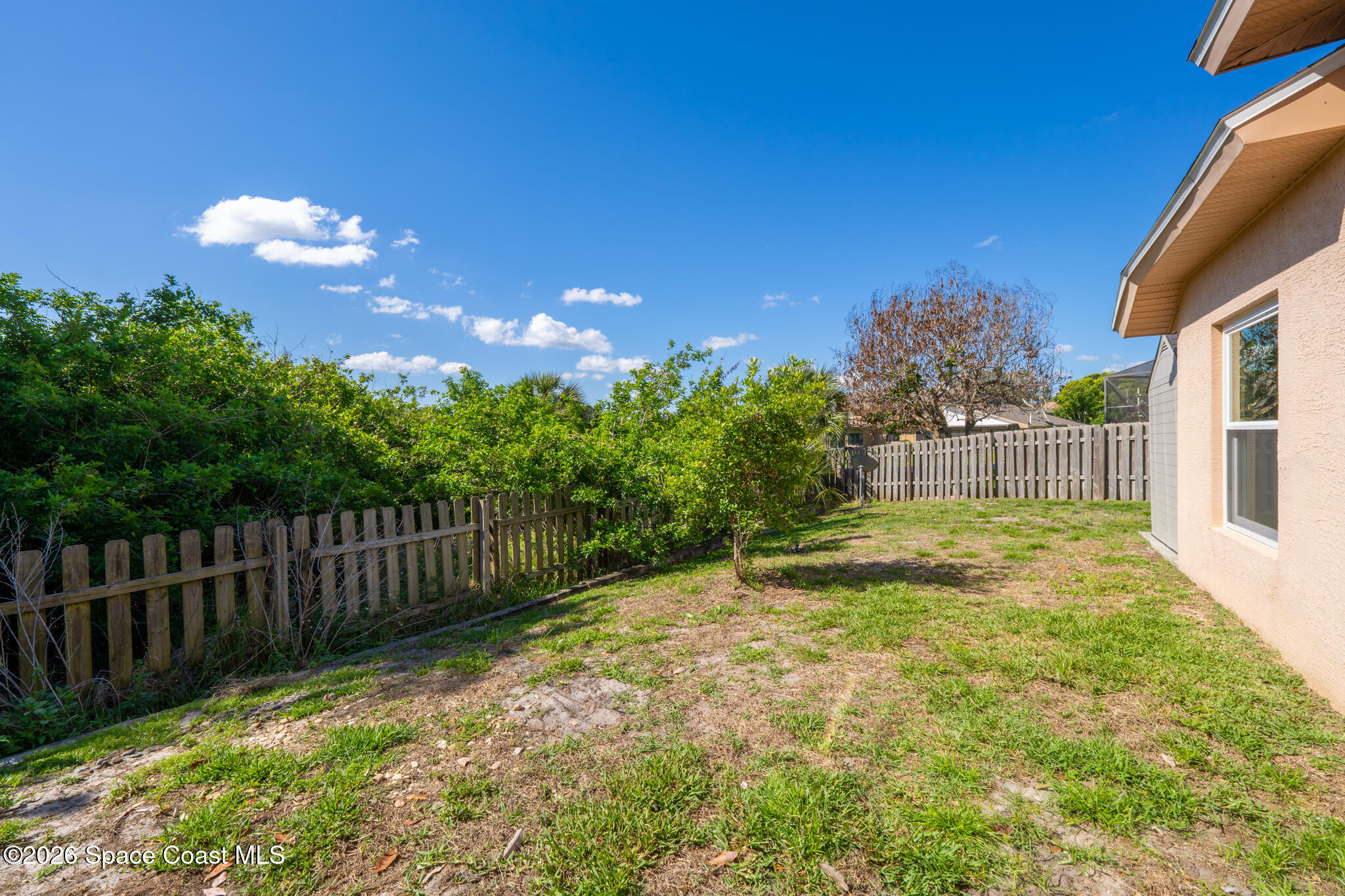 1697 Atrium Drive Melbourne, FL 32935 - Photo 34 of 42 Private Fenced Backyard