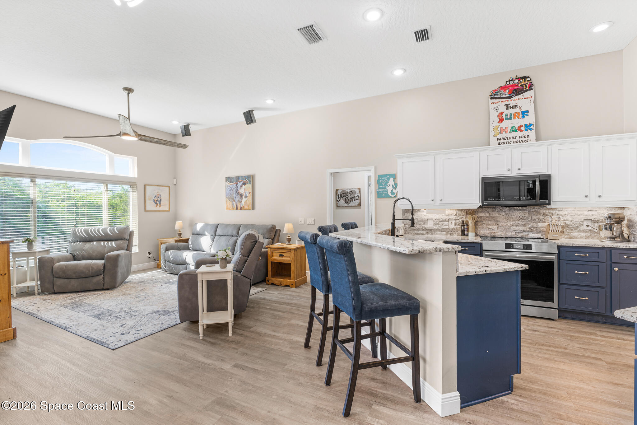 1697 Atrium Drive Melbourne, FL 32935 - Photo 6 of 42 Open Kitchen & Living