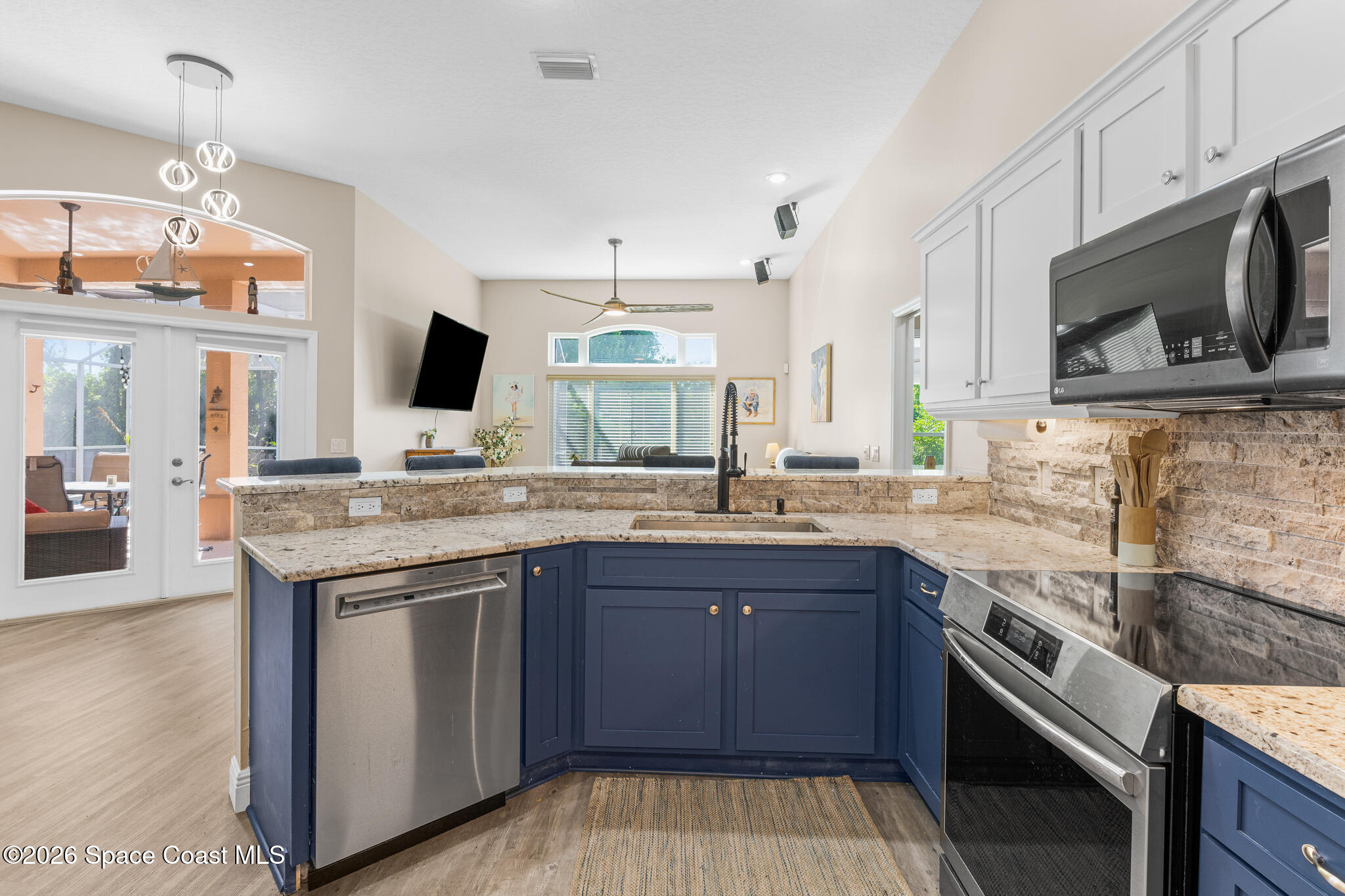 1697 Atrium Drive Melbourne, FL 32935 - Photo 8 of 42 Open Kitchen