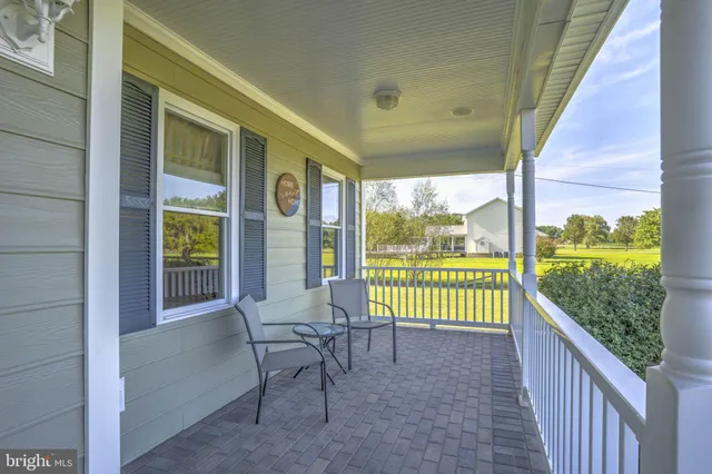 a view of a two chair in the balcony