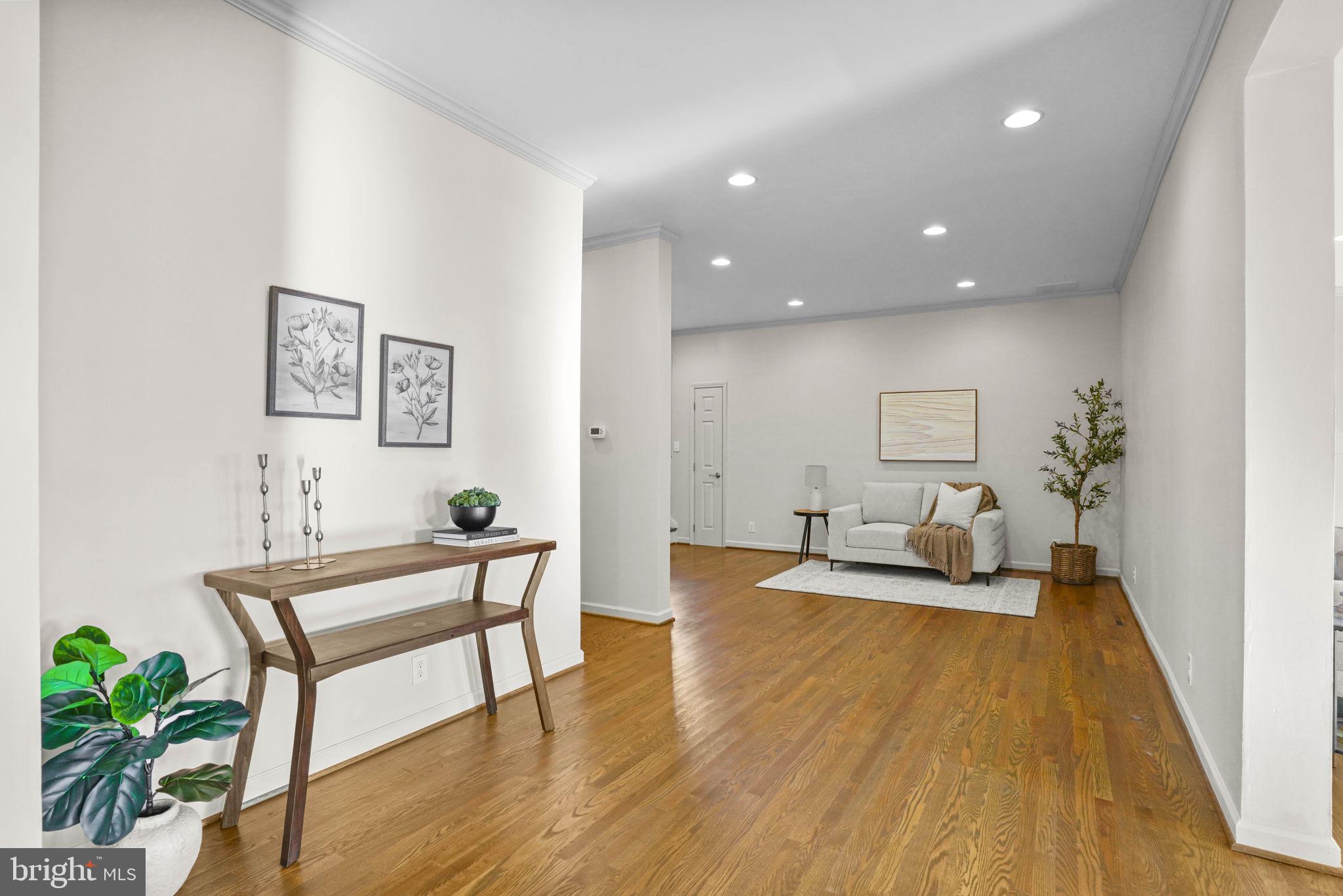 23135 Grampton Road Clements, MD 20624 - Photo 21 of 50 a living room with furniture and a wooden floor