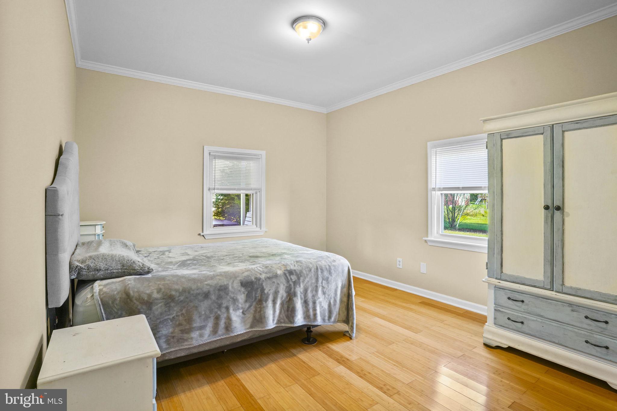 23135 Grampton Road Clements, MD 20624 - Photo 25 of 50 a bedroom with a bed and a window