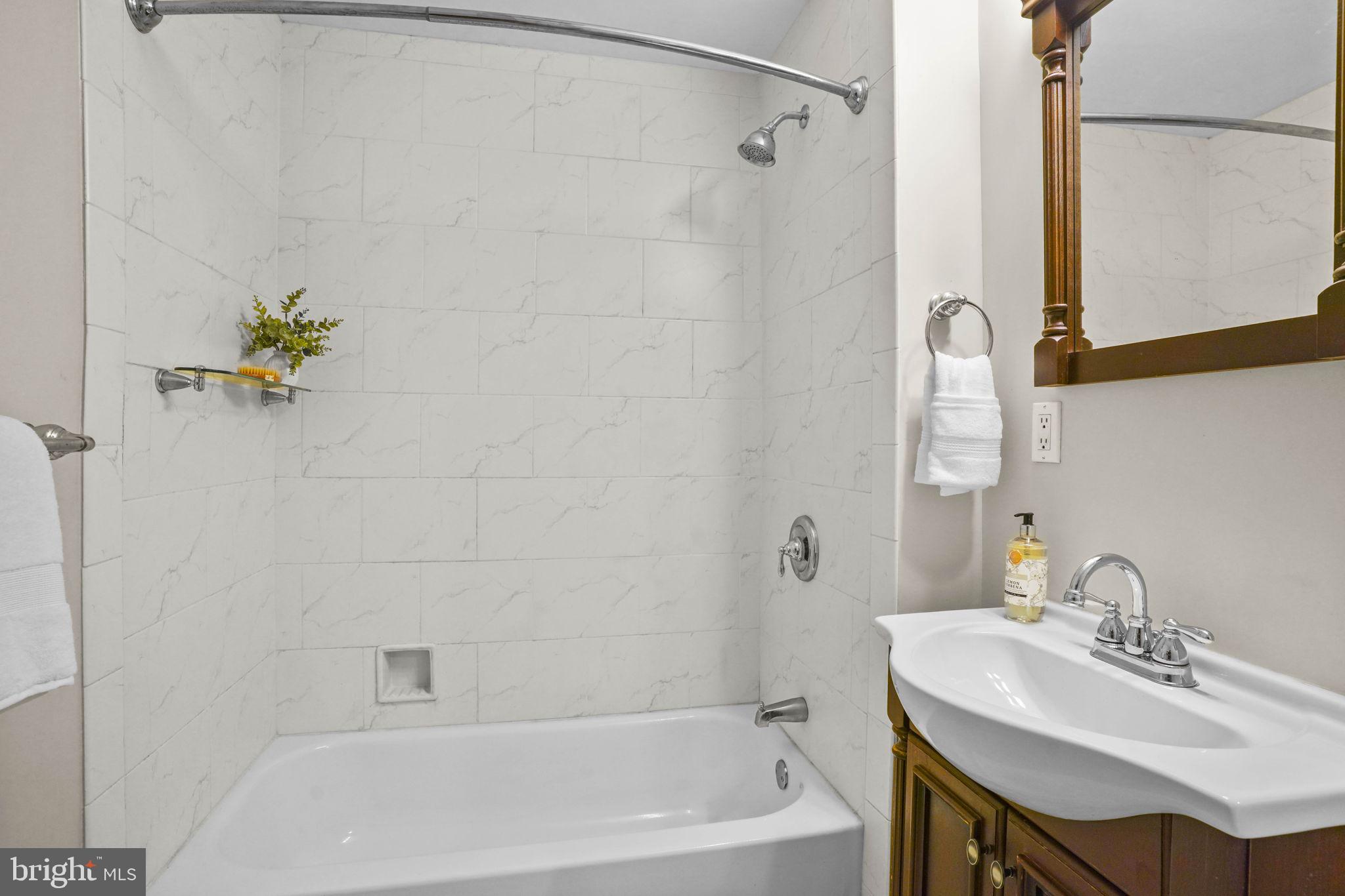 23135 Grampton Road Clements, MD 20624 - Photo 33 of 50 a white bath tub with a sink