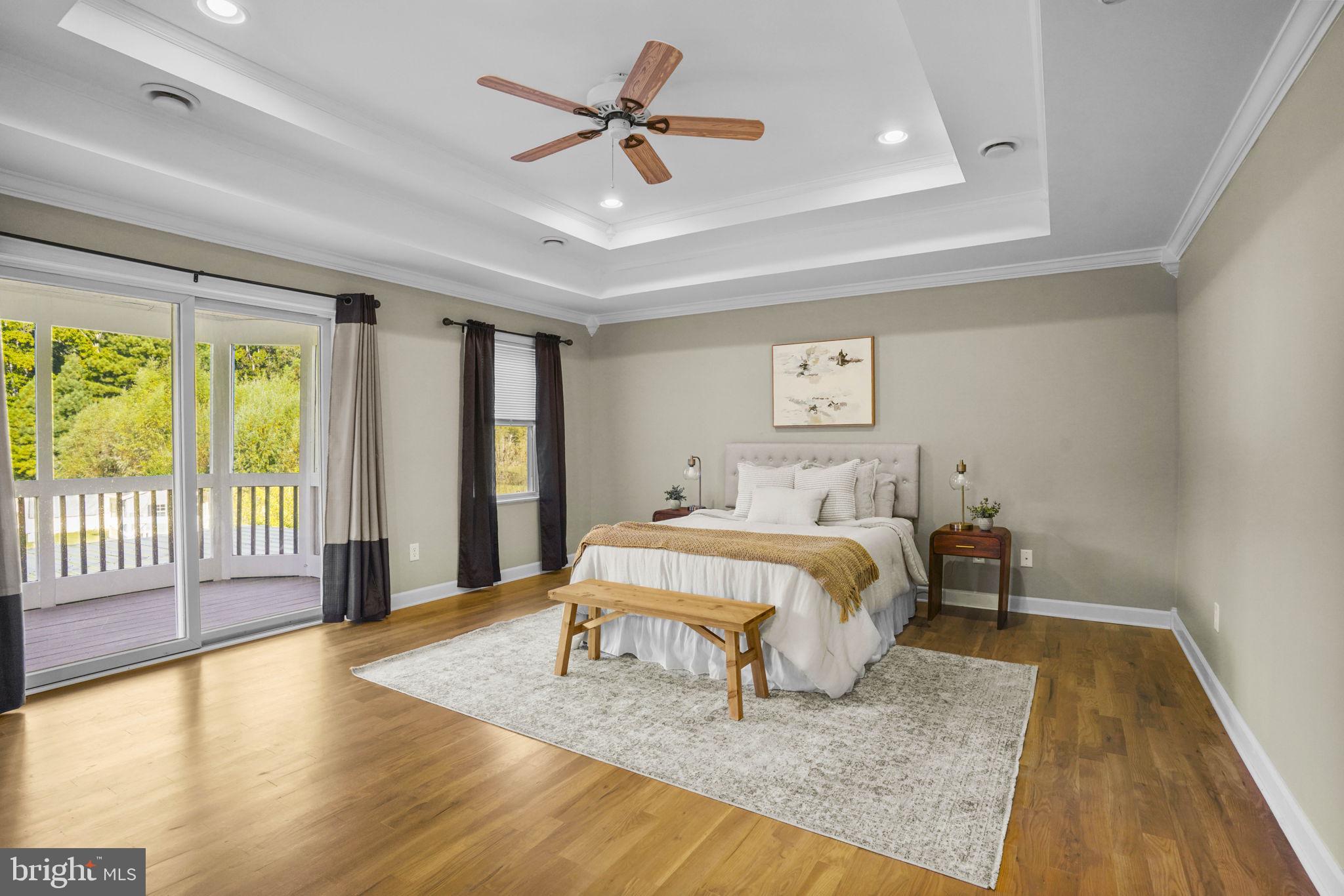 23135 Grampton Road Clements, MD 20624 - Photo 34 of 50 a bed sitting in a spacious bedroom next to a window