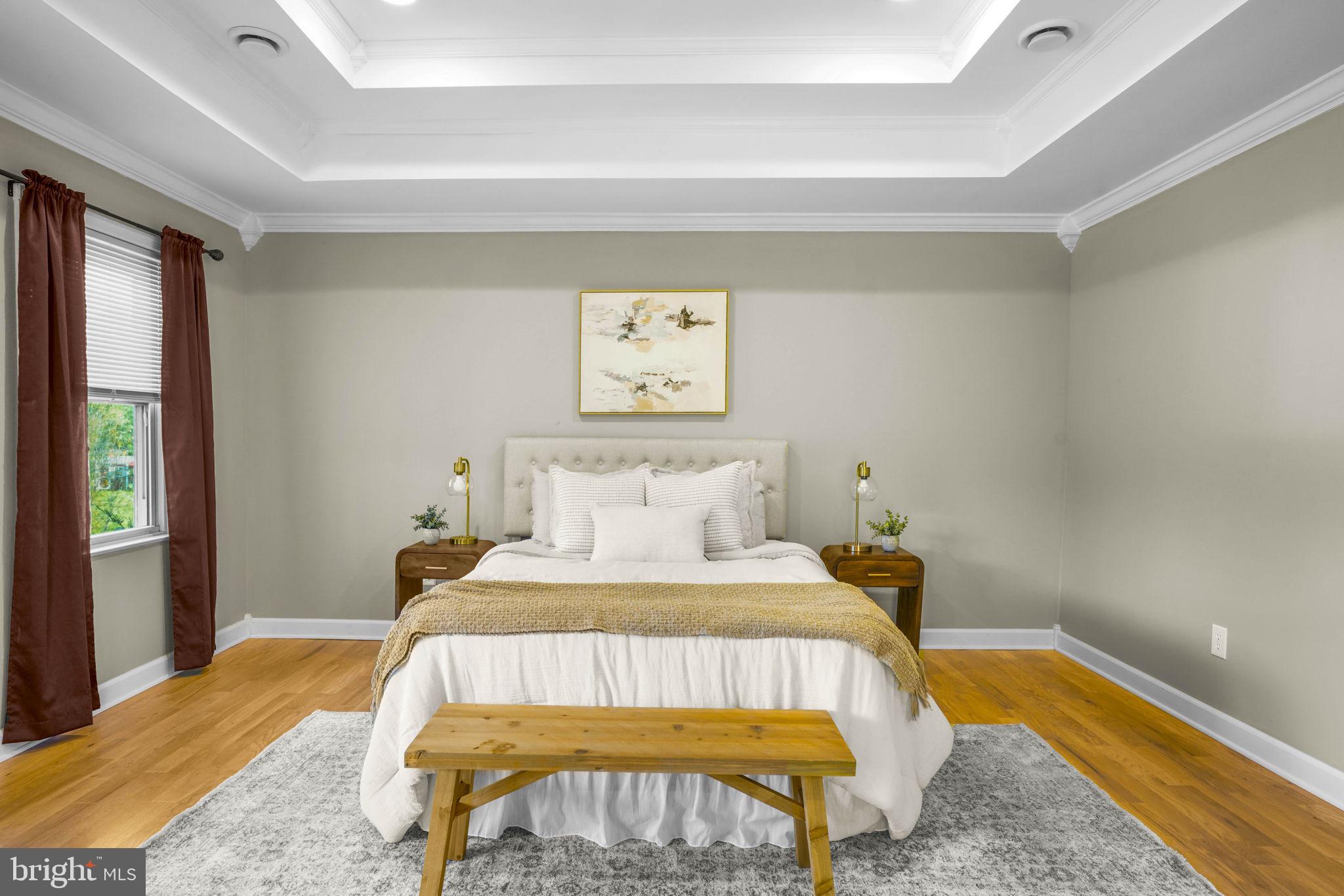 23135 Grampton Road Clements, MD 20624 - Photo 36 of 50 a bedroom with a bed and wooden floor