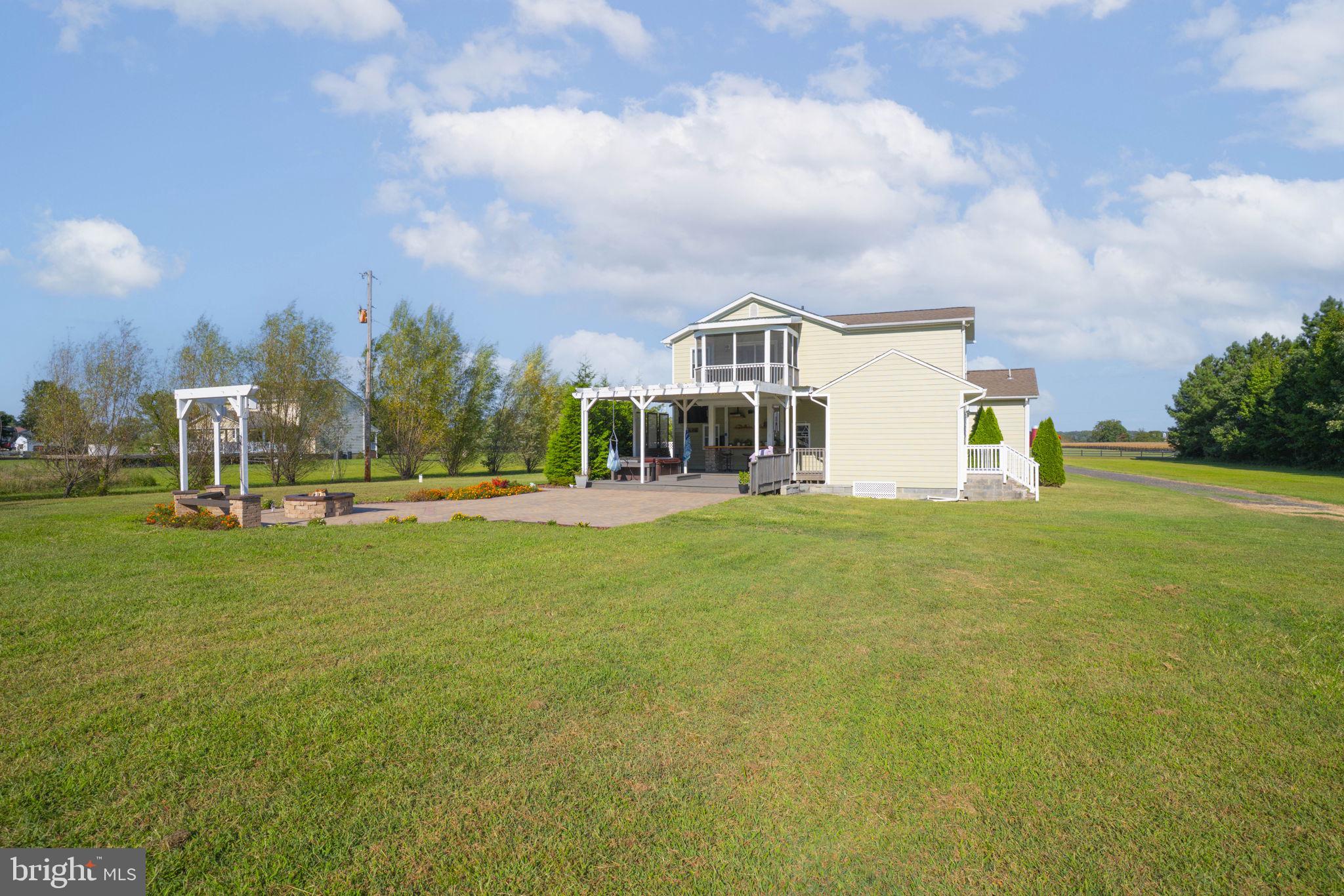 23135 Grampton Road Clements, MD 20624 - Photo 47 of 50 a view of a house with a big yard and a large tree
