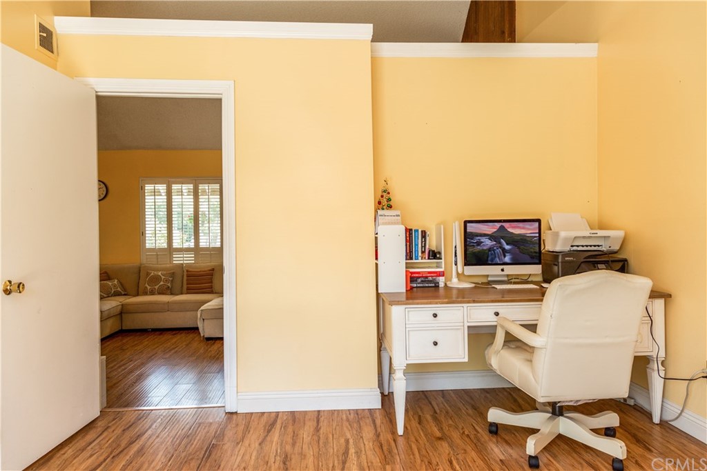 331 Bagnall Avenue Placentia, CA 92870 - Photo 11 of 37 a view of a workspace with furniture and wooden floor