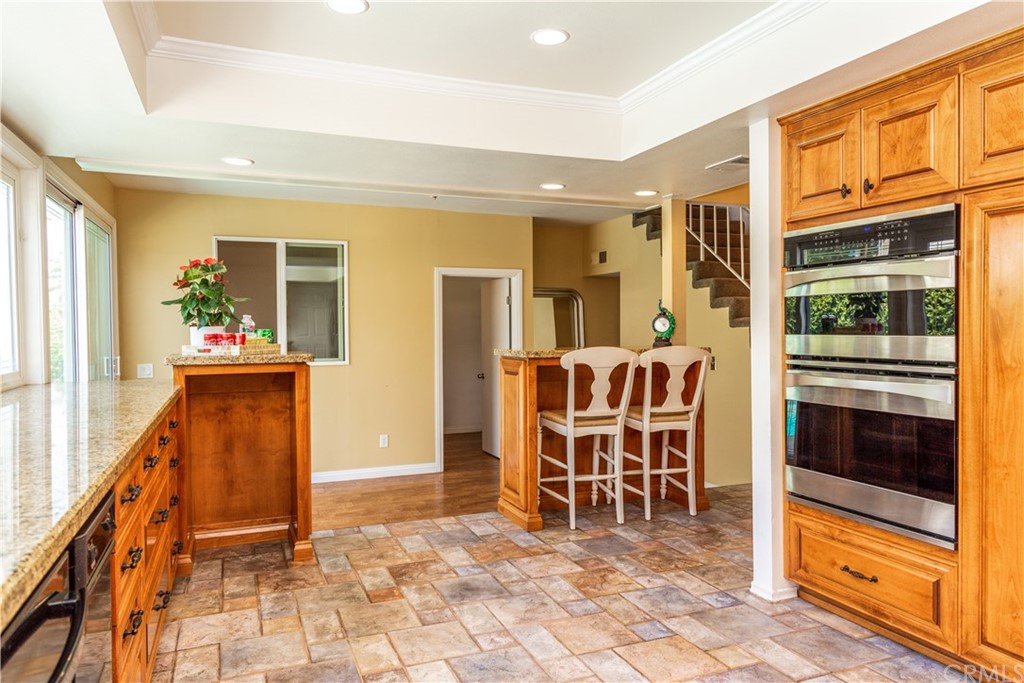 331 Bagnall Avenue Placentia, CA 92870 - Photo 16 of 37 a dining room with furniture and a view of kitchen