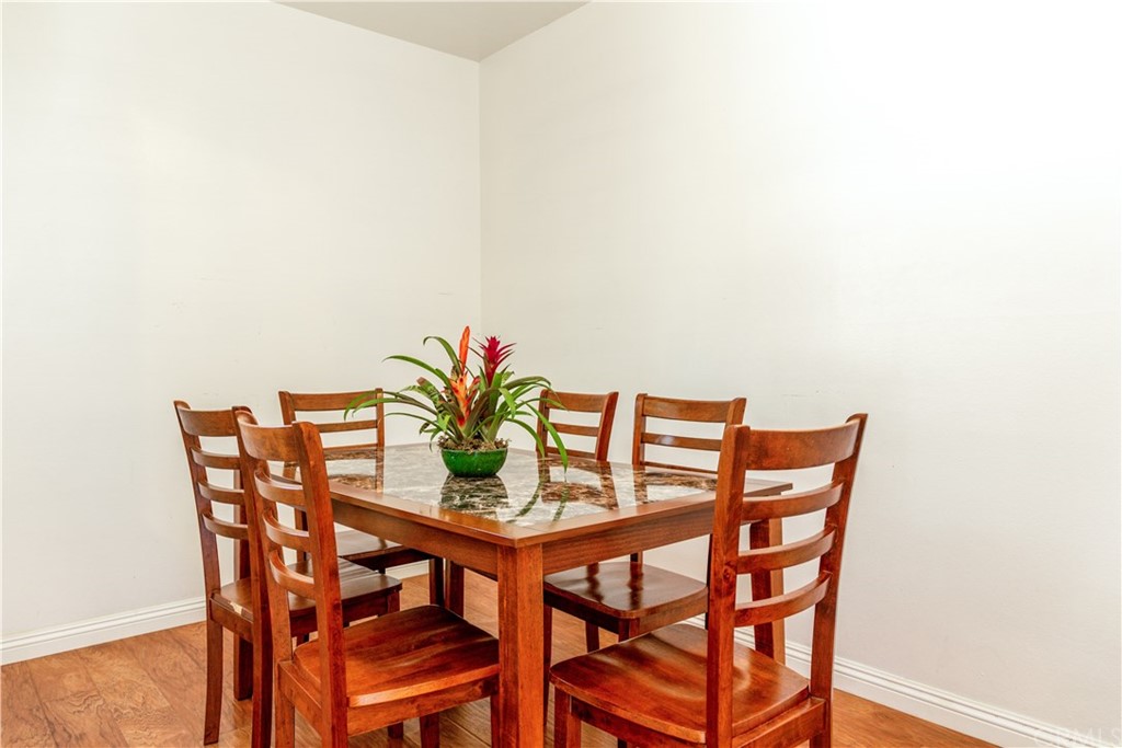 331 Bagnall Avenue Placentia, CA 92870 - Photo 18 of 37 a dining room with furniture and wooden floor