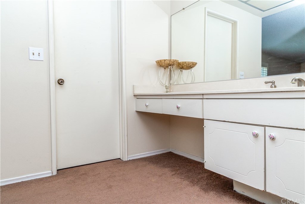 331 Bagnall Avenue Placentia, CA 92870 - Photo 22 of 37 a bathroom with a sink and a mirror