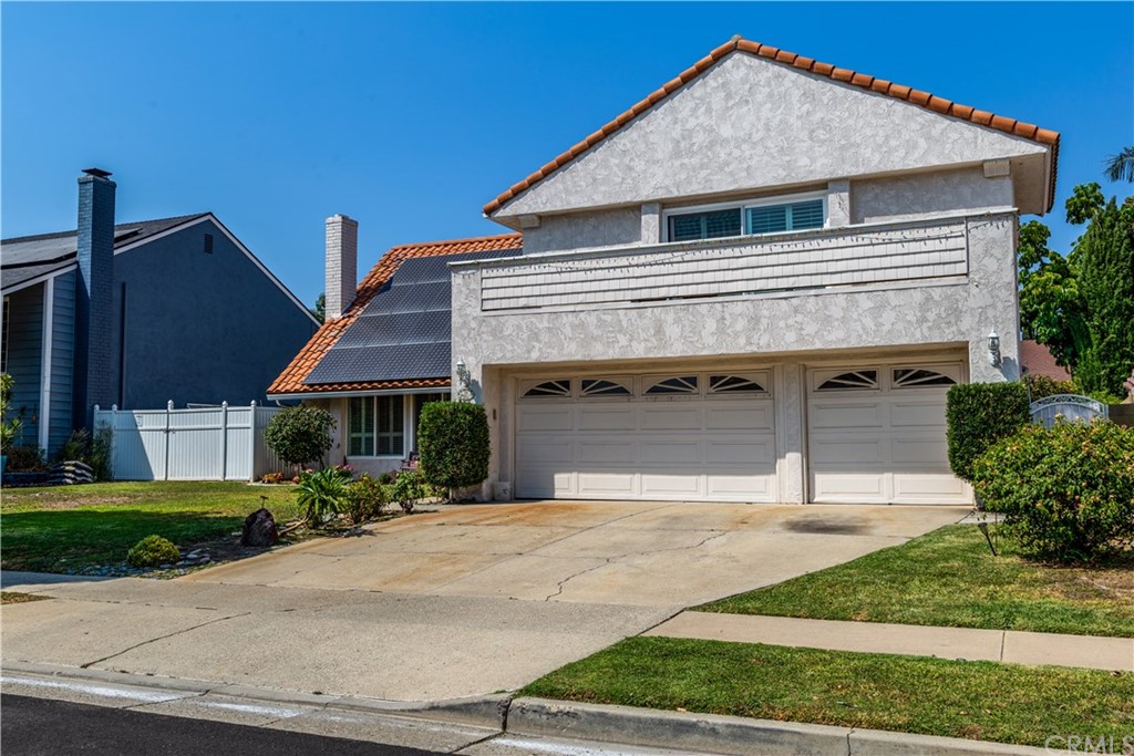 331 Bagnall Avenue Placentia, CA 92870 - Photo 3 of 37 a front view of a house with a garden and garage