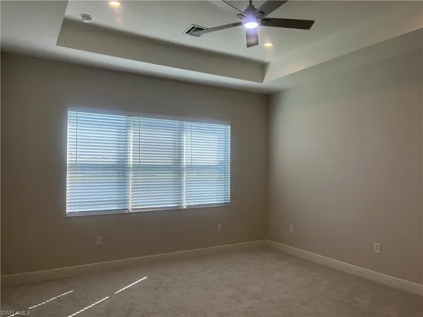 a kitchen with stainless steel appliances granite countertop a refrigerator a sink and a stove
