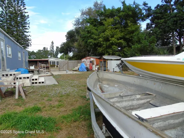 a view of swimming pool with chairs