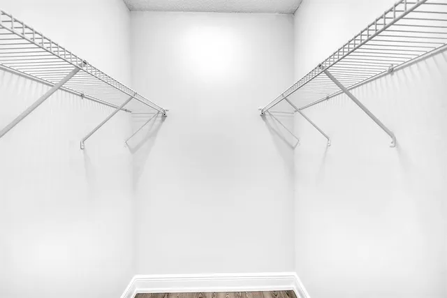 a view of small space with racks on the wall