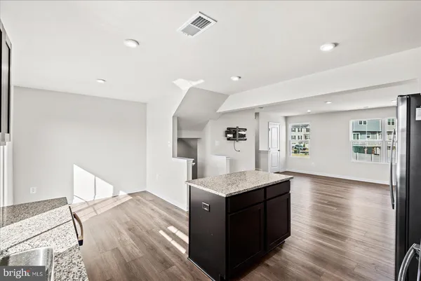 a living room with a wooden floor
