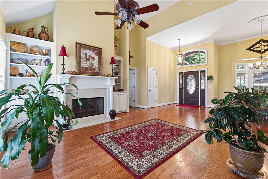 865 Laurel Ridge Road Cleveland, GA 30528 - Photo 14 of 81 a living room with furniture and a fireplace